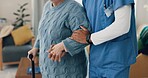 Caregiver, senior woman and walking stick for support at a nursing home in retirement. Elderly female patient with a disability and nurse man for rehabilitation, healthcare or physical therapy help