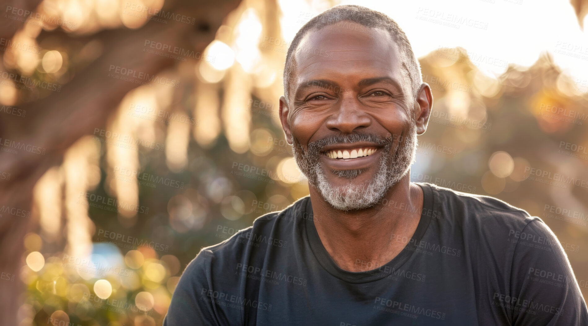 Buy stock photo Mature, man and portrait of a male laughing in a park for peace, contentment and vitality. Happy, smiling and african person radiating positivity outdoors for peace, happiness and exploration