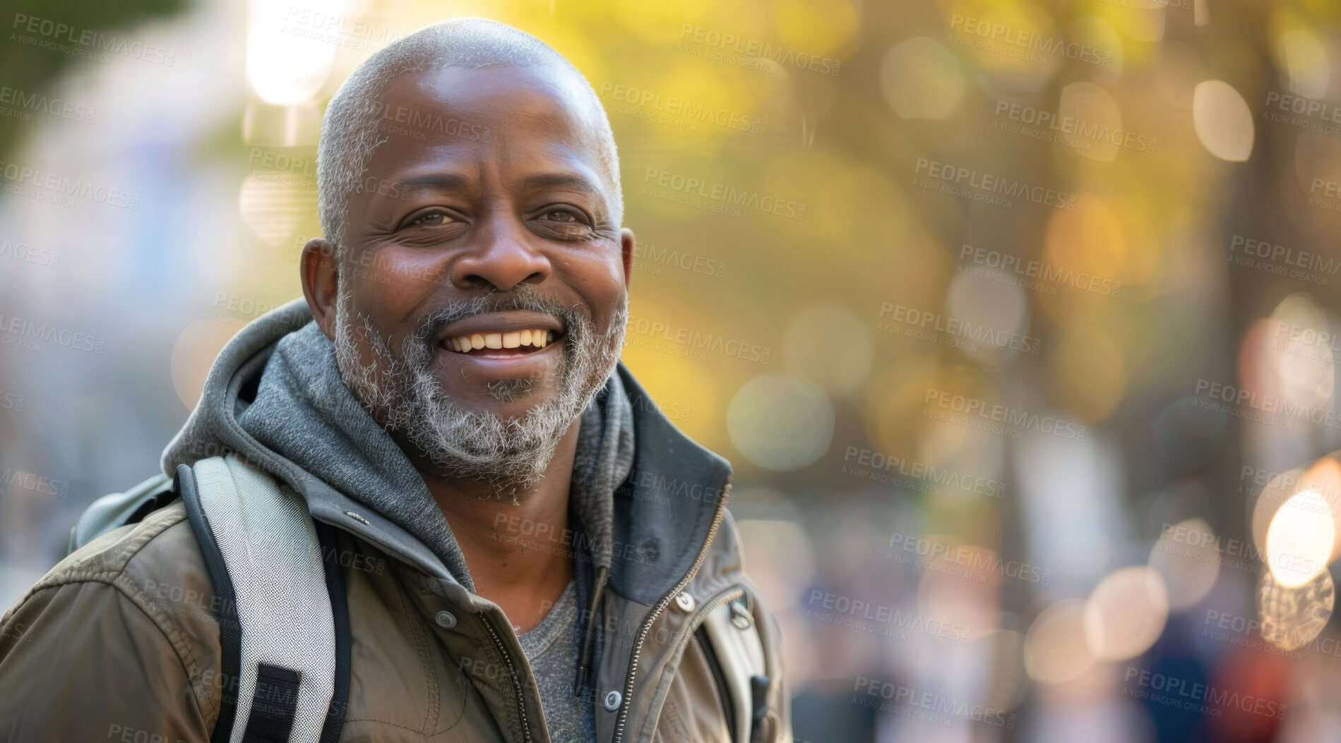 Buy stock photo Mature, man and portrait of a male laughing in a park for peace, contentment and vitality. Happy, smiling and african person radiating positivity outdoors for peace, happiness and exploration