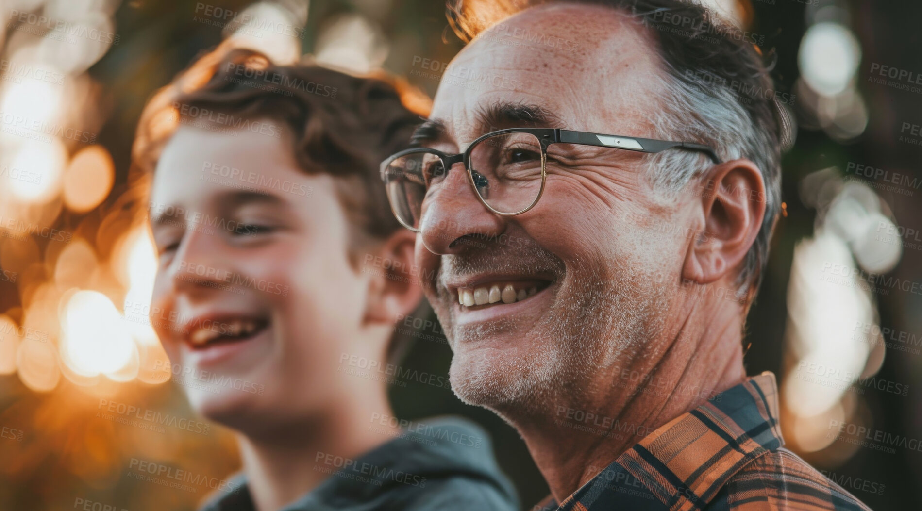 Buy stock photo Mature, man and portait of a father and teen son posing together in a park for love, bonding and care. Happy, smile and people radiating positivity outdoors for content, happiness and exploration