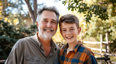 Buy stock photo Mature, man and portait of a father and teen son posing together in a park for love, bonding and care. Happy, smile and people radiating positivity outdoors for content, happiness and exploration