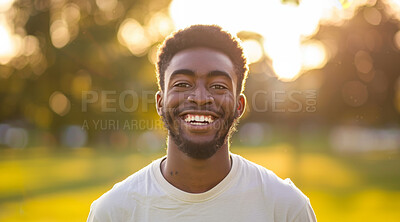 Young, man and portrait of a male laughing in a park for peace, contentment and vitality. Happy, smiling and confident african boy radiating positivity outdoors for peace, happiness and exploration