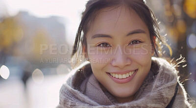 Young, woman and portrait of a female laughing in a park for peace, contentment and vitality. Happy, smiling and confident asian girl radiating positivity outdoors for peace, happiness or exploration