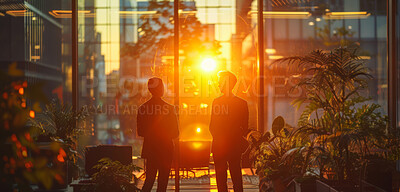 Office, silhouette and business group of people working in cafeteria, boardroom with large windows. Sunset, silhouette and city background for meeting, company and conference in modern times