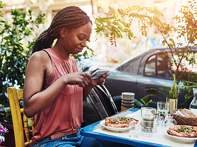 Buy stock photo Cropped shot of a woman taking a picture of her food