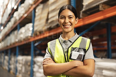 Happy woman, portrait and logistics with confidence in warehouse for supply chain or storage management. Young female person or employee with smile and arms crossed in shipping industry at depot