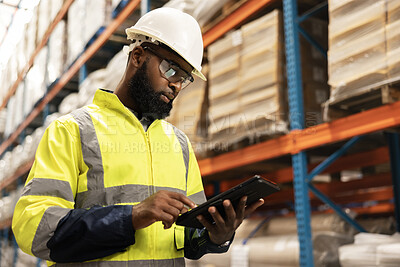Tablet, logistics and man with stock in warehouse reading email for ecommerce delivery information. Shipping, research and African male industry worker on digital technology for package in factory.