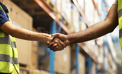 Handshake, logistics and closeup of people in warehouse with deal, collaboration or partnership. Industry, shipping and zoom of colleagues shaking hands for onboarding welcome in factory or office.
