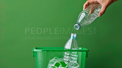 Hand, recycle and volunteer throwing bottle in dustbin for environmental, awareness and sustainability concept. Plastic and green background with copyspace for Earth Day, eco system or ecology