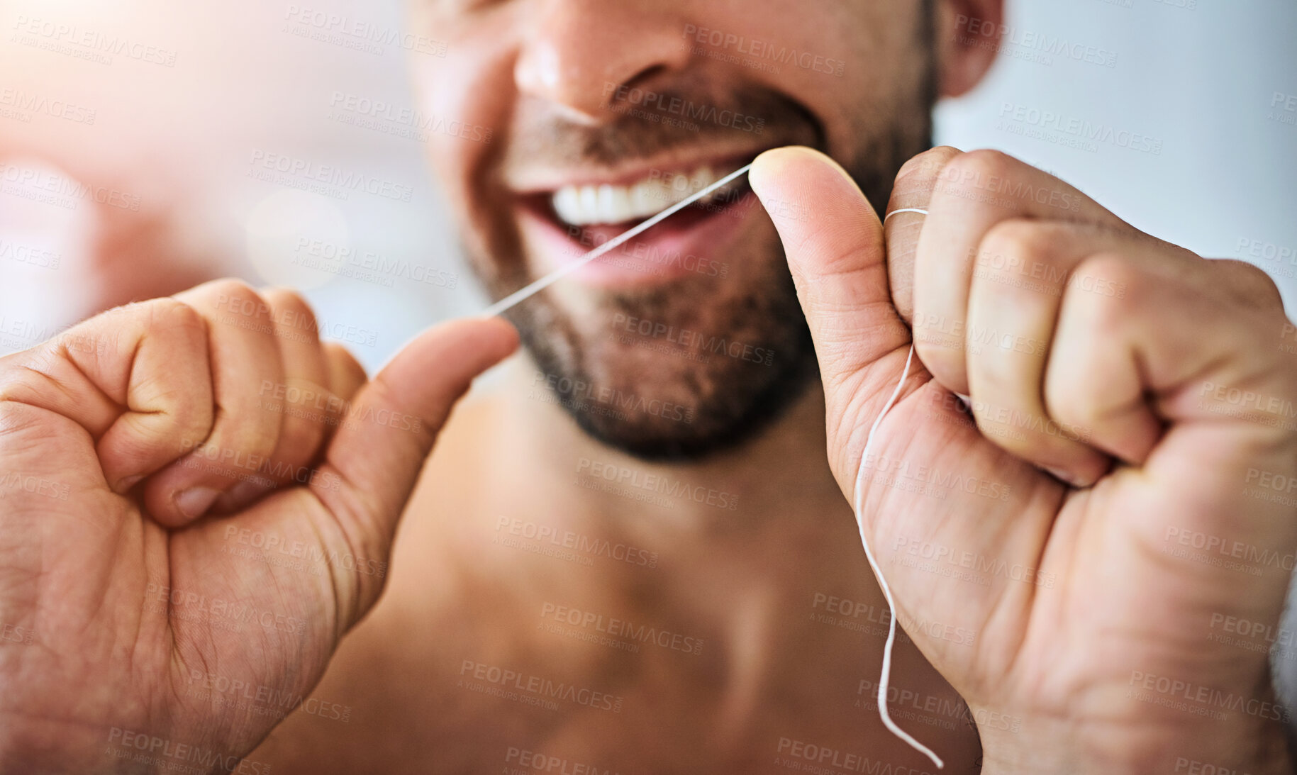 Buy stock photo Hands, face and man floss teeth for smile, dental health and care for gum gingivitis at home. Closeup of happy guy, oral thread and cleaning mouth for fresh breath, tooth hygiene and healthy habit