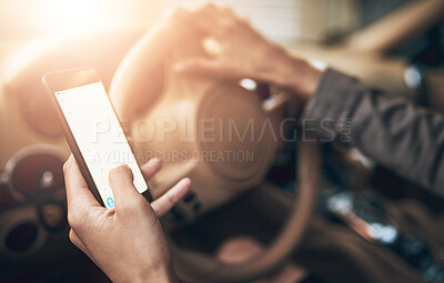 Buy stock photo Shot of an unidentifiable businesswoman using a cellphone while driving a car
