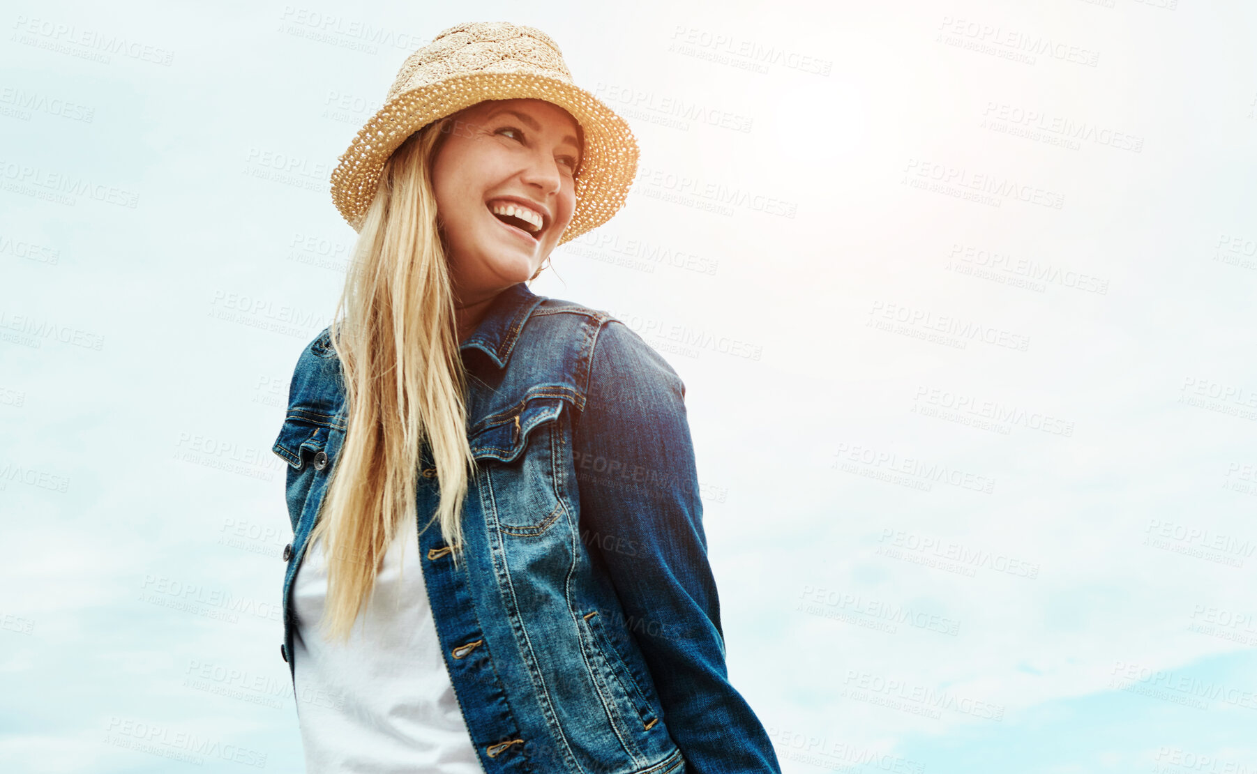Buy stock photo Woman, laughing and smile with hat, blue sky or adventure on summer holiday, travel and mockup space. Outdoor, low angle and person with stylish outfit on vacation, fashion and happiness on break