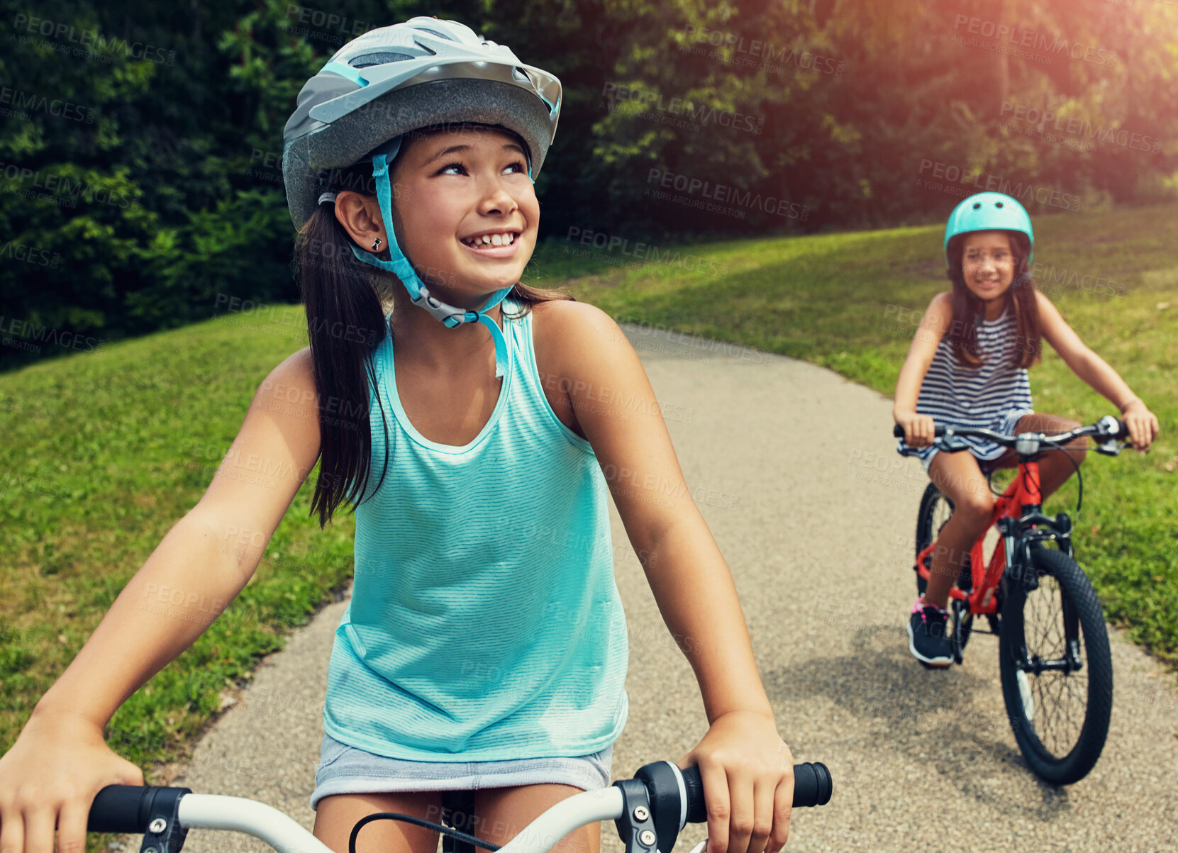 Buy stock photo Outdoor, park and children with bicycle for riding, learning and playing together with helmet for safety. Nature, path and  happy girls for cycling, bike activity and coordination with balance