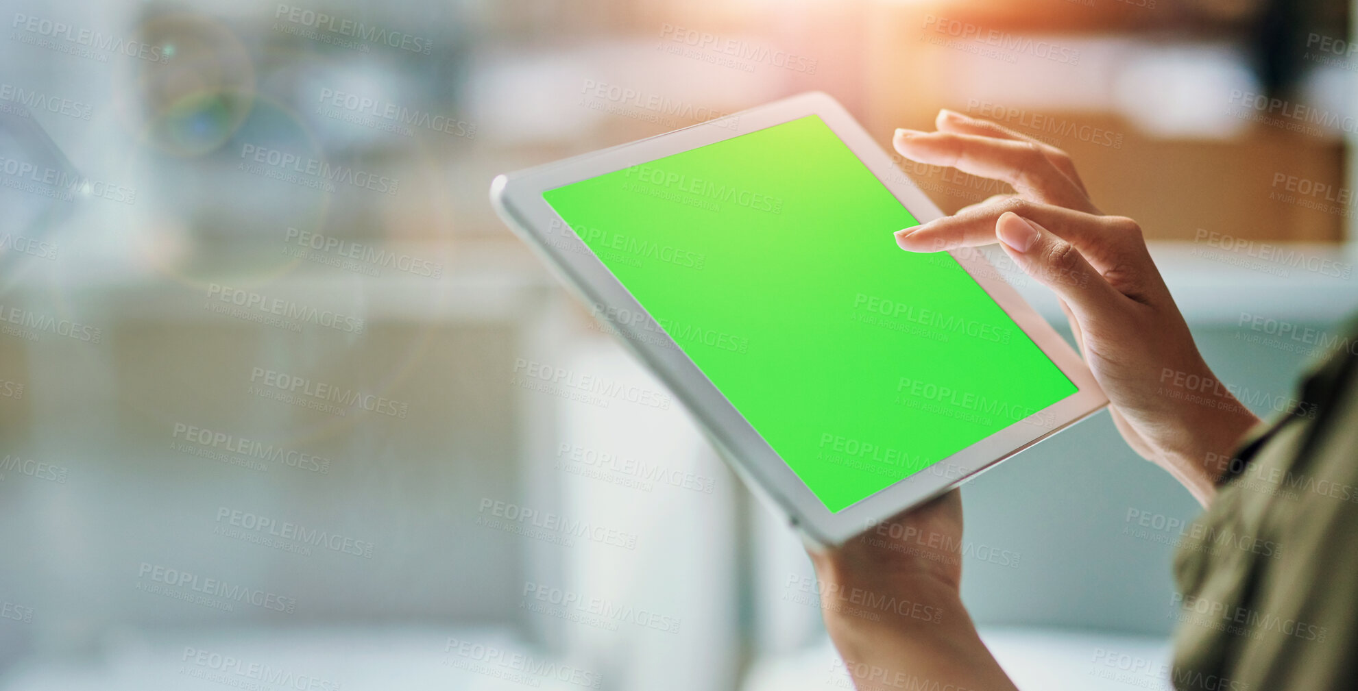 Buy stock photo Shot of an unrecognizable businesswoman using a tablet at the office