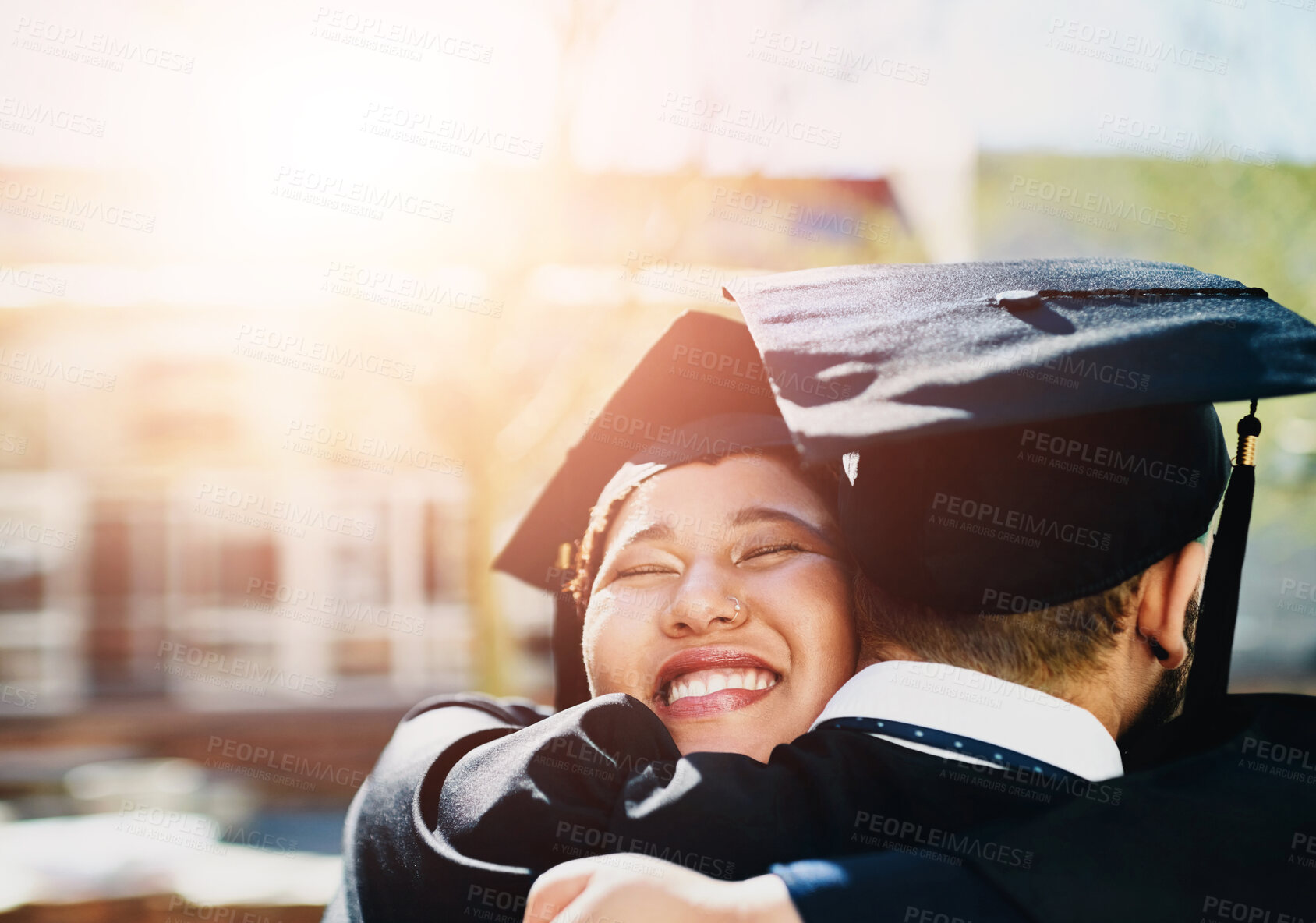 Buy stock photo Face, graduation and hug with student friends outdoor together for college or university event. Education, smile and support with people embracing for celebration of achievement or school success