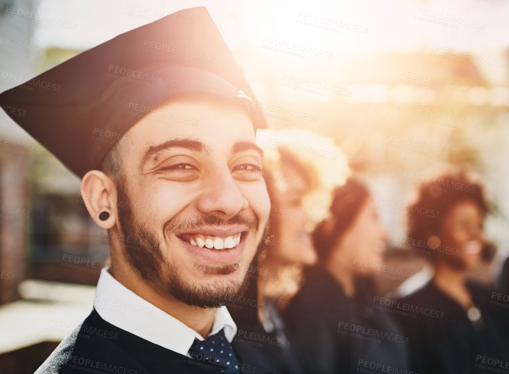 Buy stock photo Man, portrait and happiness for college graduation, smile for degree or diploma event. People, graduates and solidarity with education achievement at university campus, pride for knowledge goal