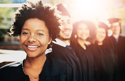 Buy stock photo Portrait of a smiling university student on graduation day with classmates in the background