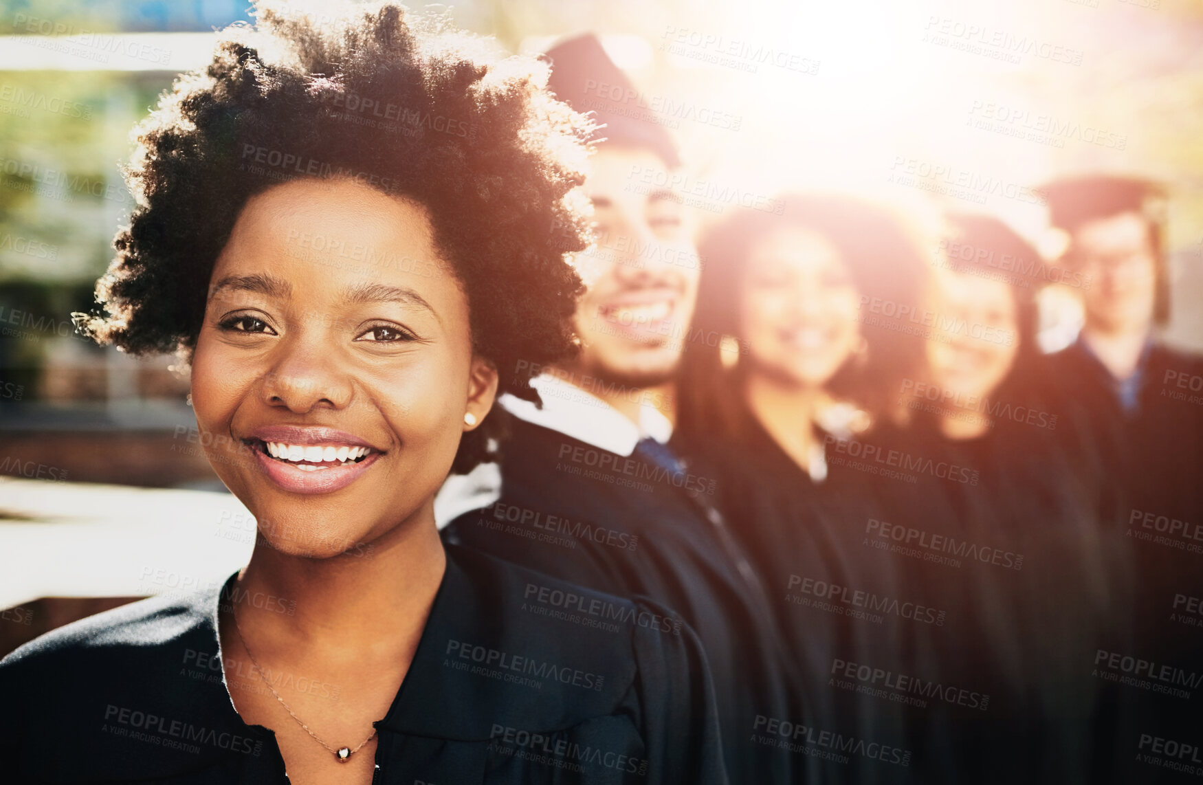 Buy stock photo Happy woman, portrait and graduation with students in line or row for outdoor ceremony at campus. Female person, graduate or smile in group for achievement, milestone or future career at university