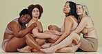 Body positive, diversity and women hug, relax and together with self love, beauty and solidarity care. Woman empowerment, lingerie shape size and friends group sitting on floor on studio background