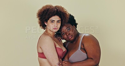 Beauty, underwear friends and women hug, solidarity and care for wellness, body positivity support or trust. Diversity portrait, lingerie and people hugging, relax or inclusion on studio background