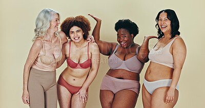 Body positive, diversity group and women excited, happy and together for underwear, natural beauty and confidence. Woman empowerment campaign, different size and portrait friends on studio background