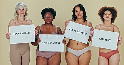 Buy stock photo Women, group and poster for self love with diversity for beauty, body positivity and portrait and smile. Friends, face and placard with affirmation, natural glow and skincare on studio background