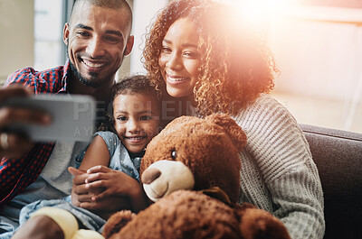 Buy stock photo Family, selfie and teddy bear in house for happiness, social media and weekend together with smile. Father, child and mother in home for internet post, memory and profile picture with bonding time