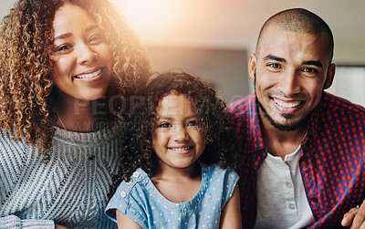 Buy stock photo Happy family, portrait and love relaxing together with sofa, support and bonding in home. Man, woman and parents with excited daughter and smile on couch in house living room for weekend care