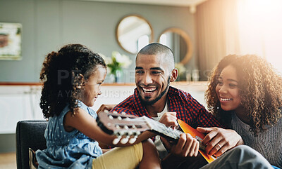 Buy stock photo Guitar, happy and teaching with family in home living room together for bonding or relax. Funny, instrument or smile with mom, dad and daughter in apartment for child development, learning or lesson