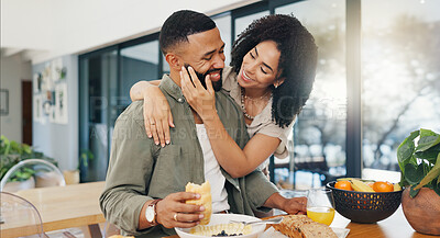 Happy couple, surprise and breakfast at table with hug, talking and bonding together in morning with love. Man, woman and eating healthy food on kitchen counter, embrace and care in marriage in home