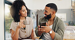 Couple, happy and coffee with smartphone for social media, sharing music or app explanation. Man, woman and technology in kitchen with breakfast for morning, relaxing and scrolling on online website