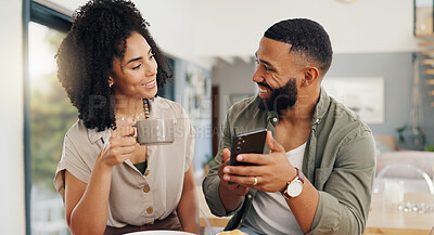 Couple, happy and coffee with smartphone for social media, sharing music or app explanation. Man, woman and technology in kitchen with breakfast for morning, relaxing and scrolling on online website