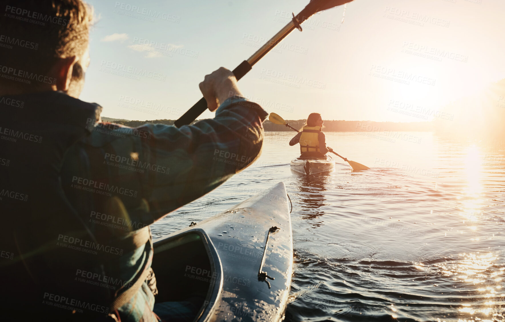 Buy stock photo Back of man, kayak and woman on lake with rowing, fitness or travel in nature. Couple, together and adventure in ocean for journey, vacation or freedom in evening for support, trust or love at sunset