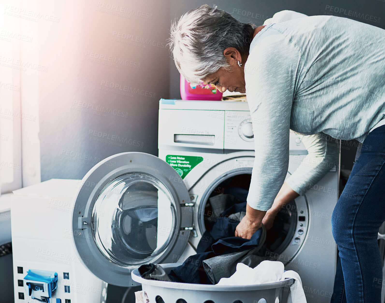 Buy stock photo Woman, washing machine and laundry in home for cleaning, hygiene and daily chores for wellness. Housework, female person and basket of clothes or linen in apartment for morning routine in apartment