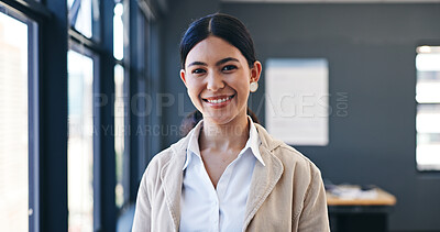 Face, smile and business woman at window in office for corporate or professional company career. Portrait, work and happy with confident young employee in workplace for job opportunity or ambition