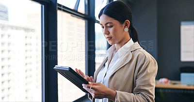 Tablet, research and business woman in the office for corporate legal project by glass window. Planning, digital technology and female attorney scroll on internet for law information in workplace.
