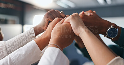 Holding hands, collaboration and support with business team in office closeup for unity or solidarity. Trust, partnership and community with employee group in company workplace for togetherness