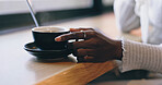 Coffee shop, relax and hands of woman by window with drink for calm, wellness and breakfast in cafe. Restaurant, weekend and person with mug, aroma and scent for latte, caffeine and cappuccino