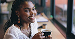 Coffee shop, happy and black woman by window with drink for relaxing, calm and breakfast in cafe. Restaurant, weekend and face of person with mug, aroma and scent for latte, caffeine and cappuccino