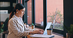 Coffee shop, thinking and woman with a laptop, typing and connection with internet, creativity and copywriter. Cafe, person or girl with computer, ideas or opportunity with thoughts or writing a blog