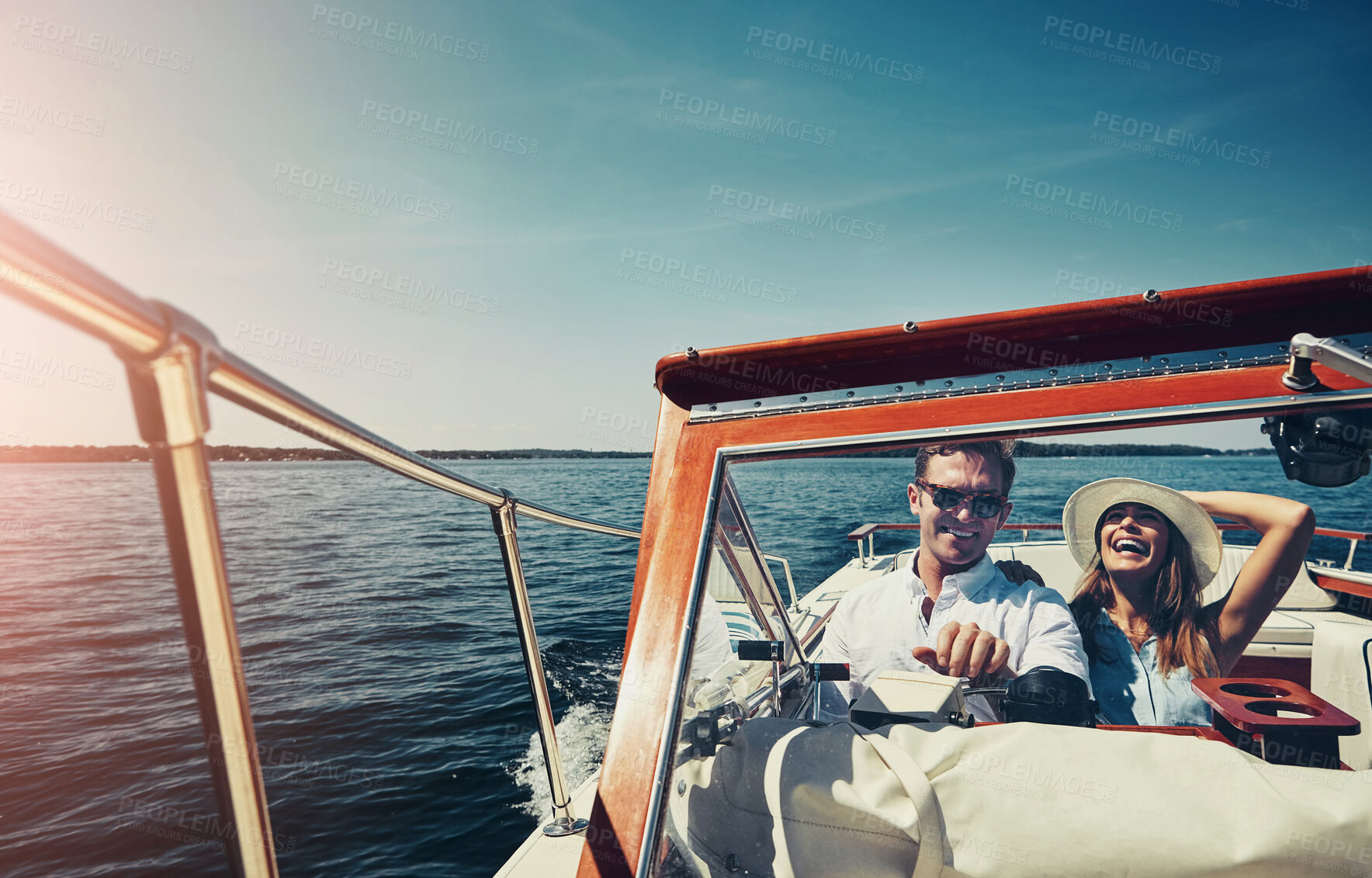 Buy stock photo Ocean, boat and couple in portrait for driving, adventure and vacation journey in Sweden. Happy people, husband and wife in lake for honeymoon, romantic and sailing for bonding in yacht outdoor