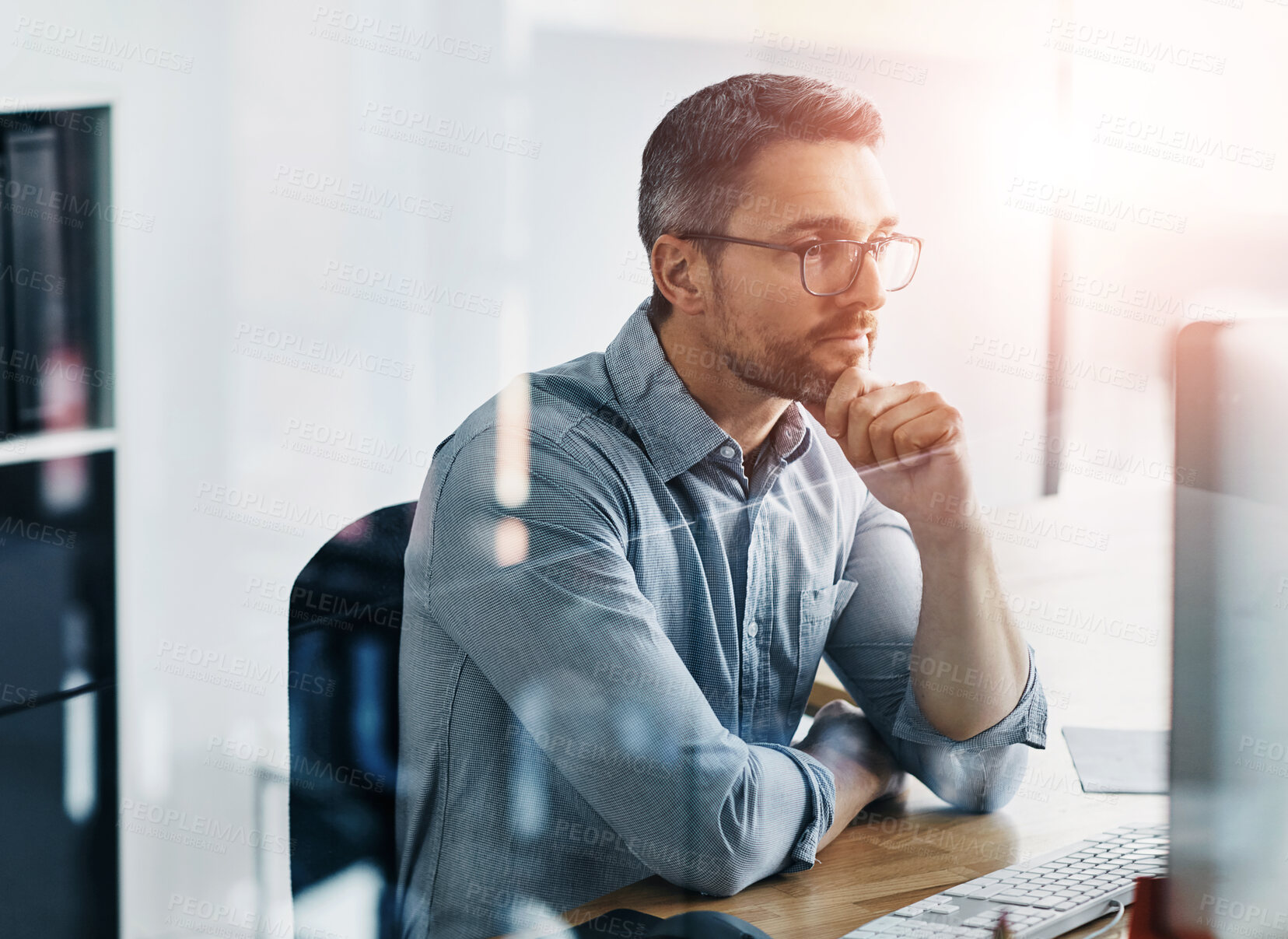 Buy stock photo Thinking, computer and businessman in office reading information on stock exchange for investment. Ideas, research and male financial analyst planning company budget with online report on desktop.