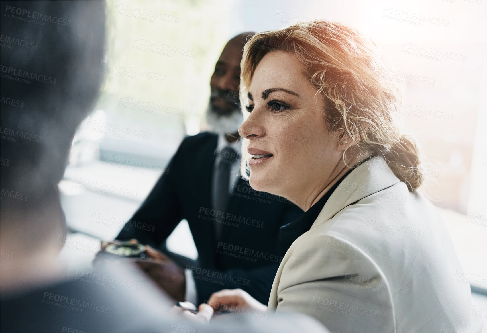 Buy stock photo Meeting, corporate and business woman in office for listening, project development or collaboration. Lens flare, consulting agency and employee with colleagues for discussion, planning or ideas