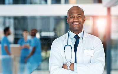 Buy stock photo Health, arms crossed and portrait of black man in hospital with doctor for confidence, medical support or wellness. Lens flare, trust and medic with stethoscope for consulting, medicine or service