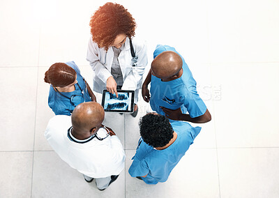 Buy stock photo Top view, doctors and group with tablet screen, x ray and teamwork for surgery analysis in hospital. Wellness, medical and professional people with tech, advice and collaboration for healthcare