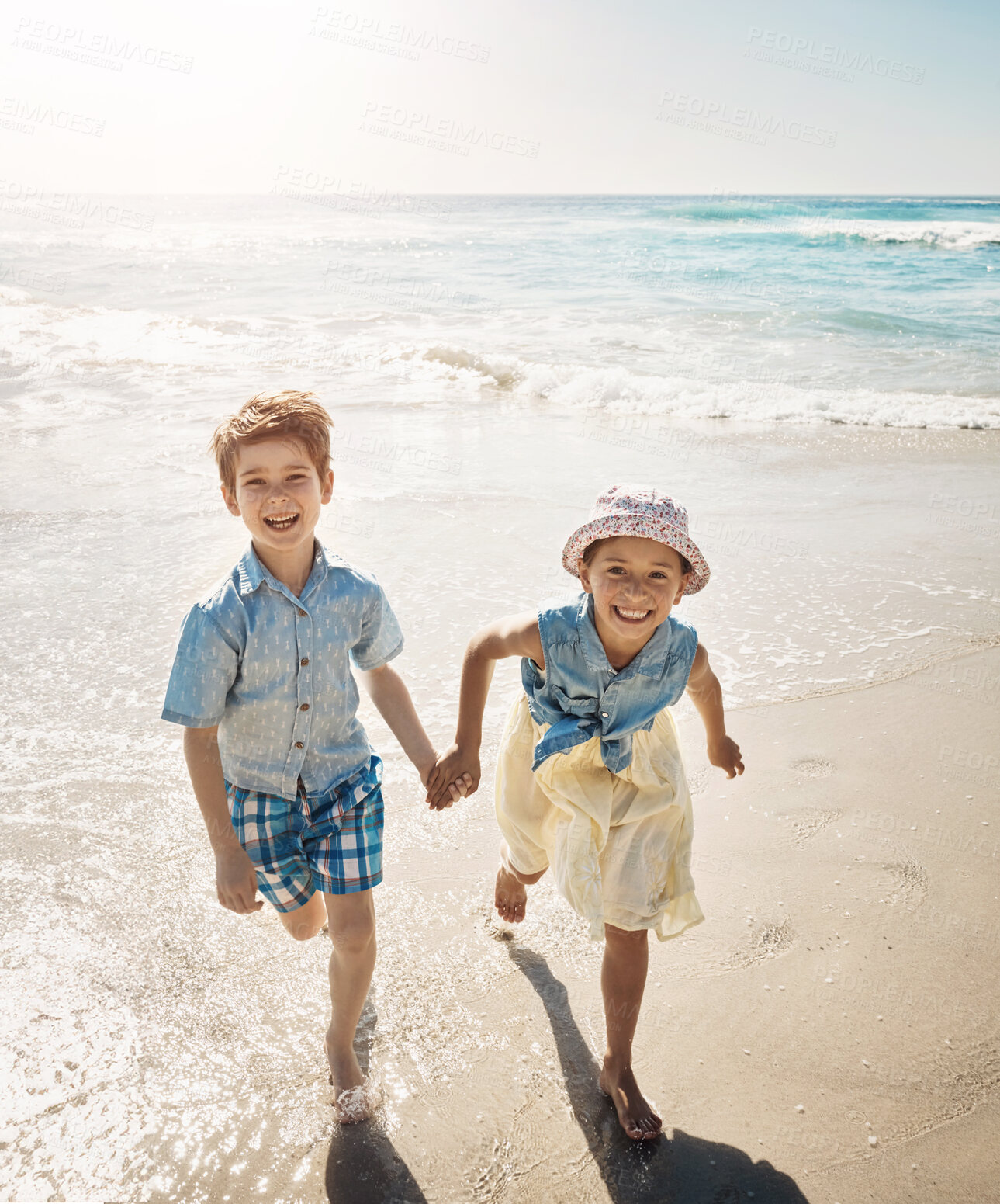 Buy stock photo Beach, smile and portrait of children holding hands on holiday, vacation and tropical adventure. Happy family, summer and young boy and girl by ocean for bonding, playing in waves and fun outdoors