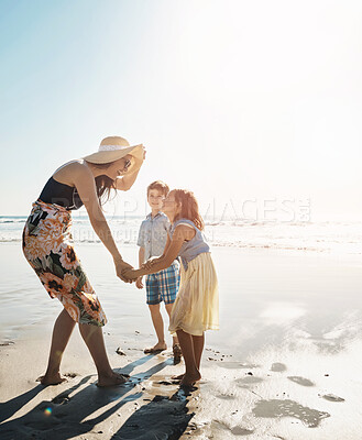 Buy stock photo Love, holding hands and mother with kids at the beach for summer, fun and bonding on adventure in nature together. Happy family, playing and woman with children at the sea for morning games in Bali