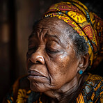 Praying, elderly African and woman. Senior, female and mental or spiritual health concept. Thinking, contentment and peaceful, eyes closed for focus, well being and religious practice or worship