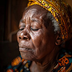 Praying, elderly African and woman. Senior, female and mental or spiritual health concept. Thinking, contentment and peaceful, eyes closed for focus, well being and religious practice or worship