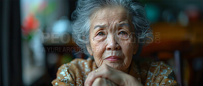 Portrait, elderly Asian and woman close-up. Senior, female and thoughtful in old age home. Pensioner, depressed and looking. Blurry background for mental health and reminiscing about past life